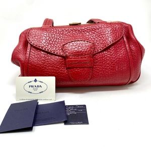 Vintage Prada red leather Boston style bag. Includes certification. No dustbag.